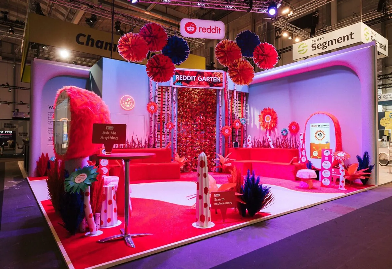 Branded experiential activation stand at a public event