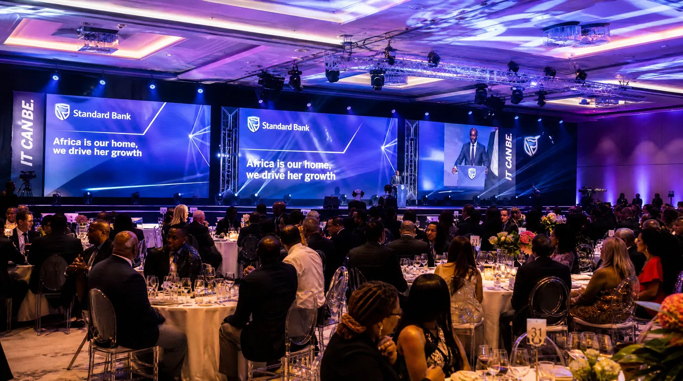 A large-scale corporate gala dinner with professional staging, lighting and full turnkey event production in South Africa