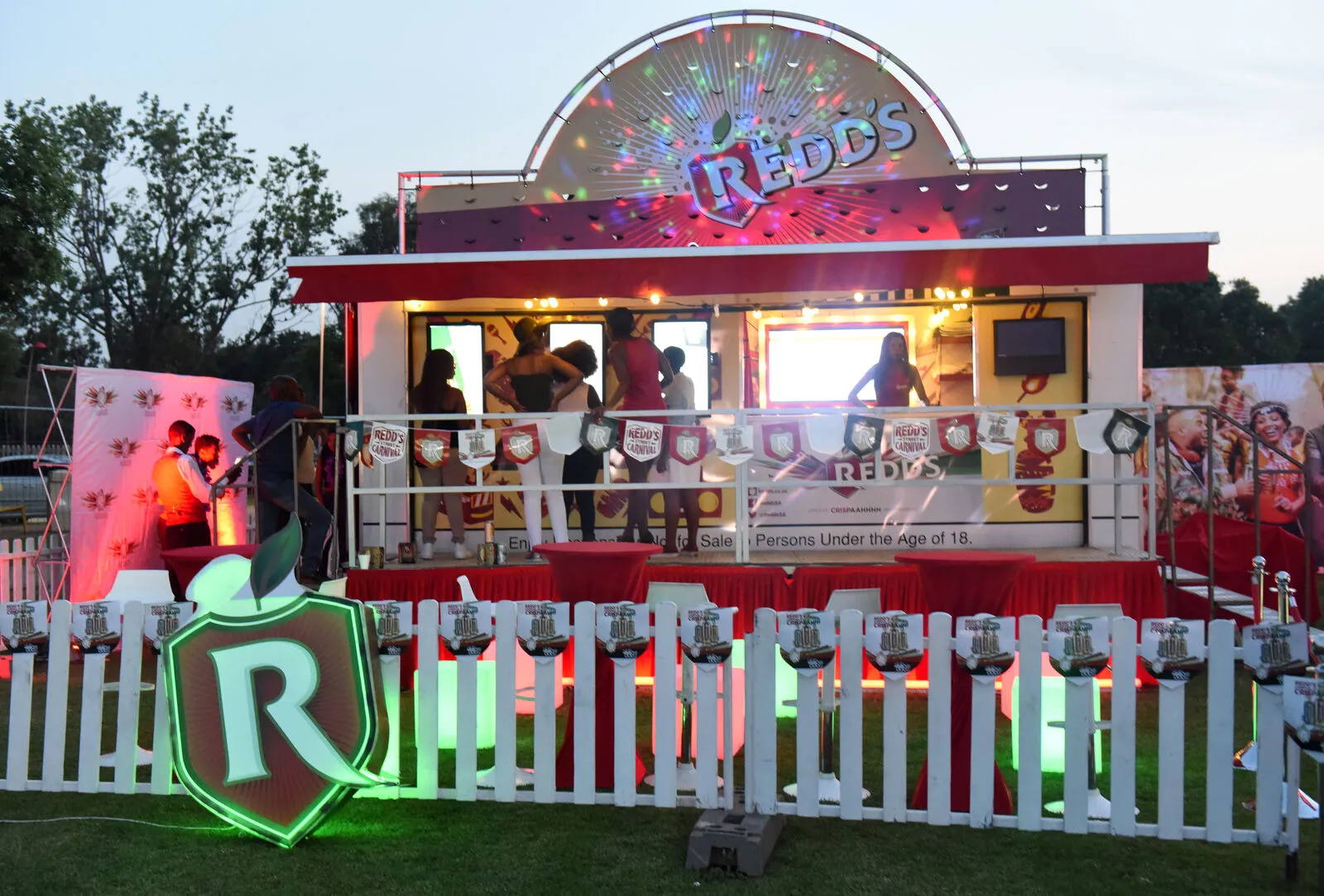 Redd's outdoor brand activation stand at dusk produced by B&W Productions