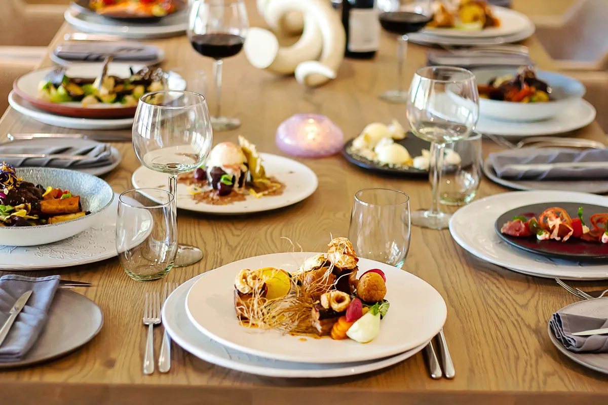 An elegant candlelit long-table dinner styled for a 40th birthday celebration