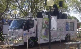 White pop-up bar container unit at an outdoor event