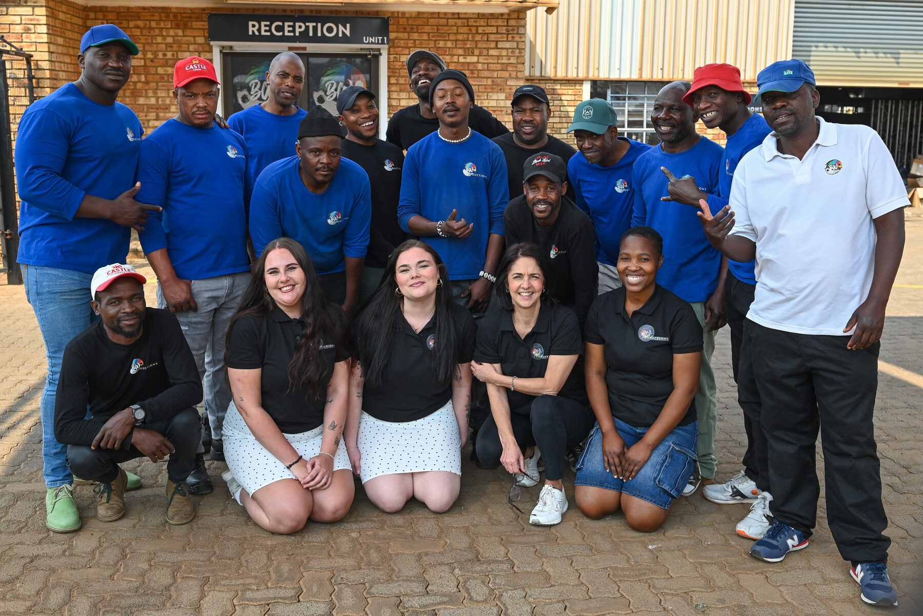 The full B&W Productions team — office staff, crew, workers and partners together outside the Randvaal headquarters
